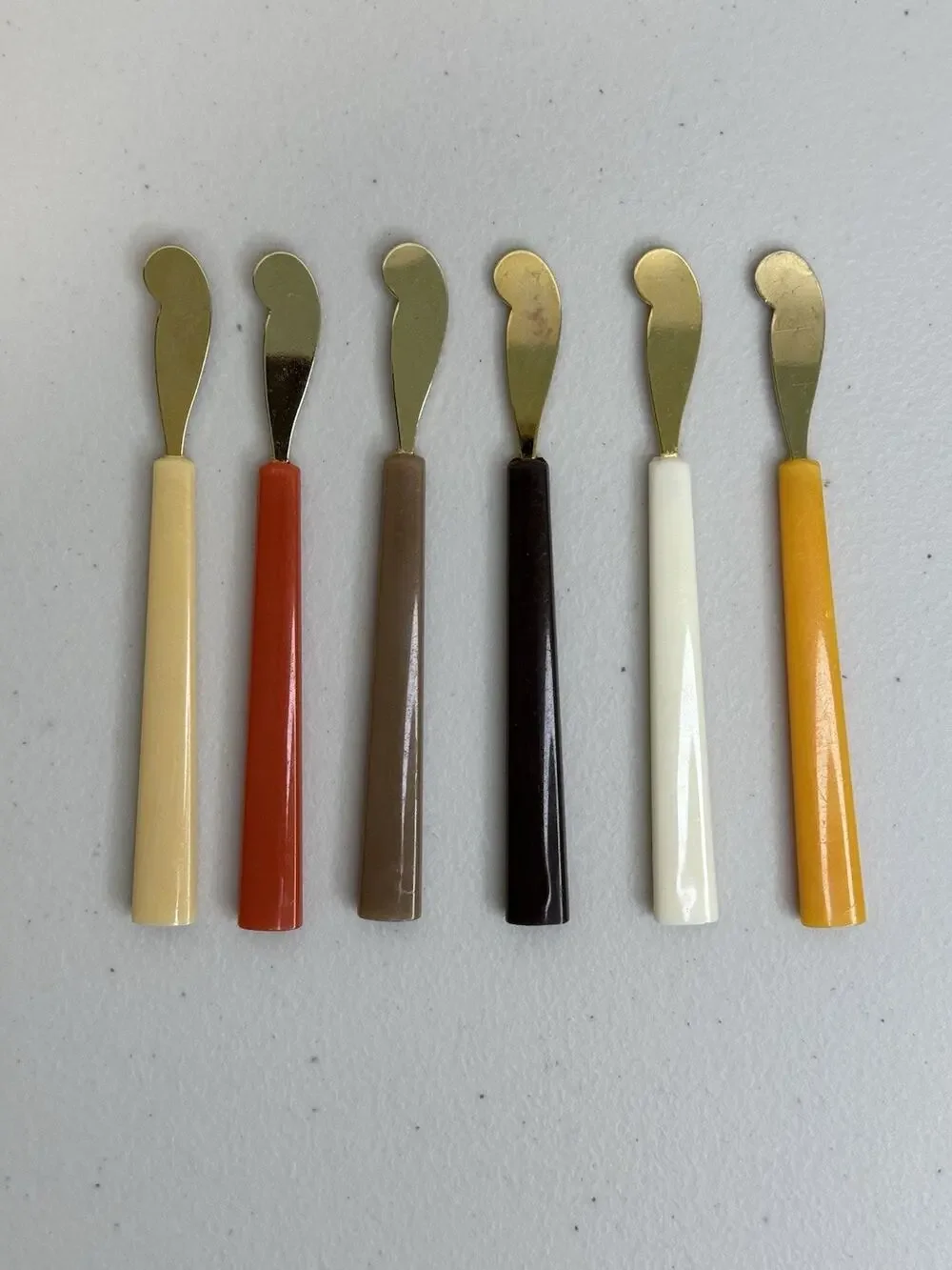 6 MCM Lucite Utensil Cheese Spreaders Bakelite Handles Gold Tone Stainless Steel